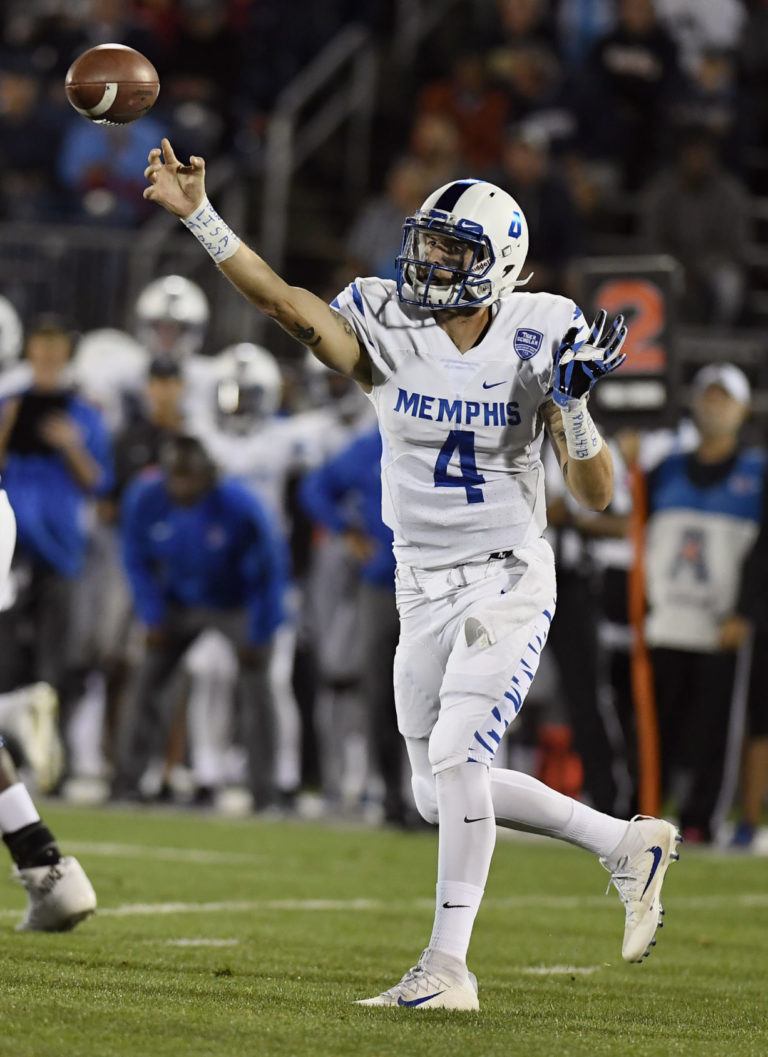 Ferguson throws for 7 TDs, Memphis routs UConn 70-31 - The Garden Island