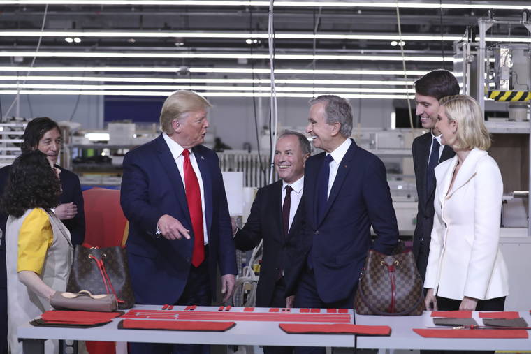 In Texas, Trump tours Louis Vuitton workshop ahead of rally