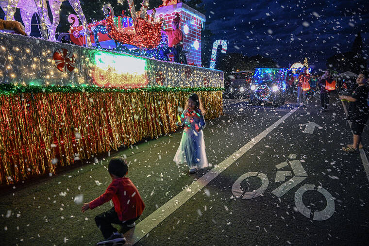 Thousands turn out for Lights on Rice parade The Garden Island